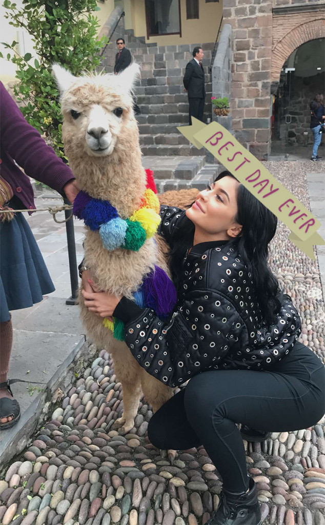 Kylie Jenner Cuddles Babies At Health Clinic During Philanthropic